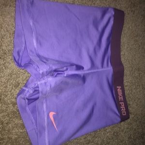 Purple + pink Nike pros, size S